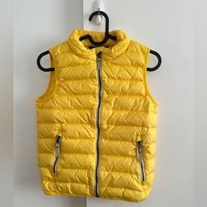 Hanna Andersson kids yellow down puffer vest Sz 8 Small Stain On The Back